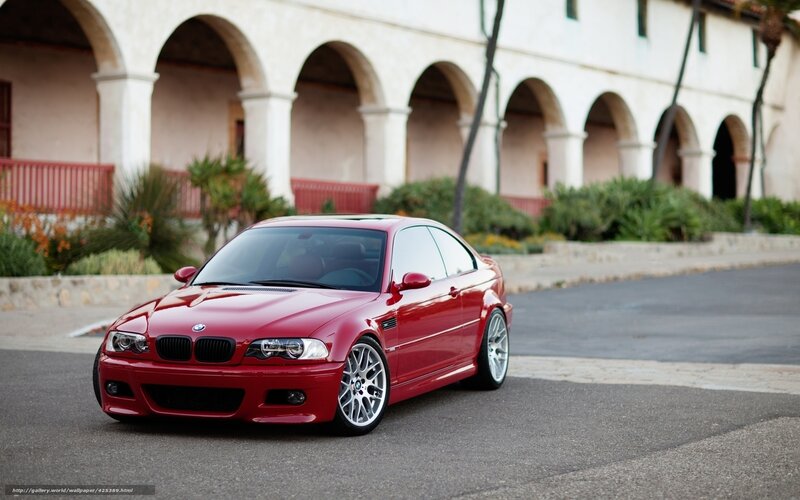 Red BMW M3 parked outside