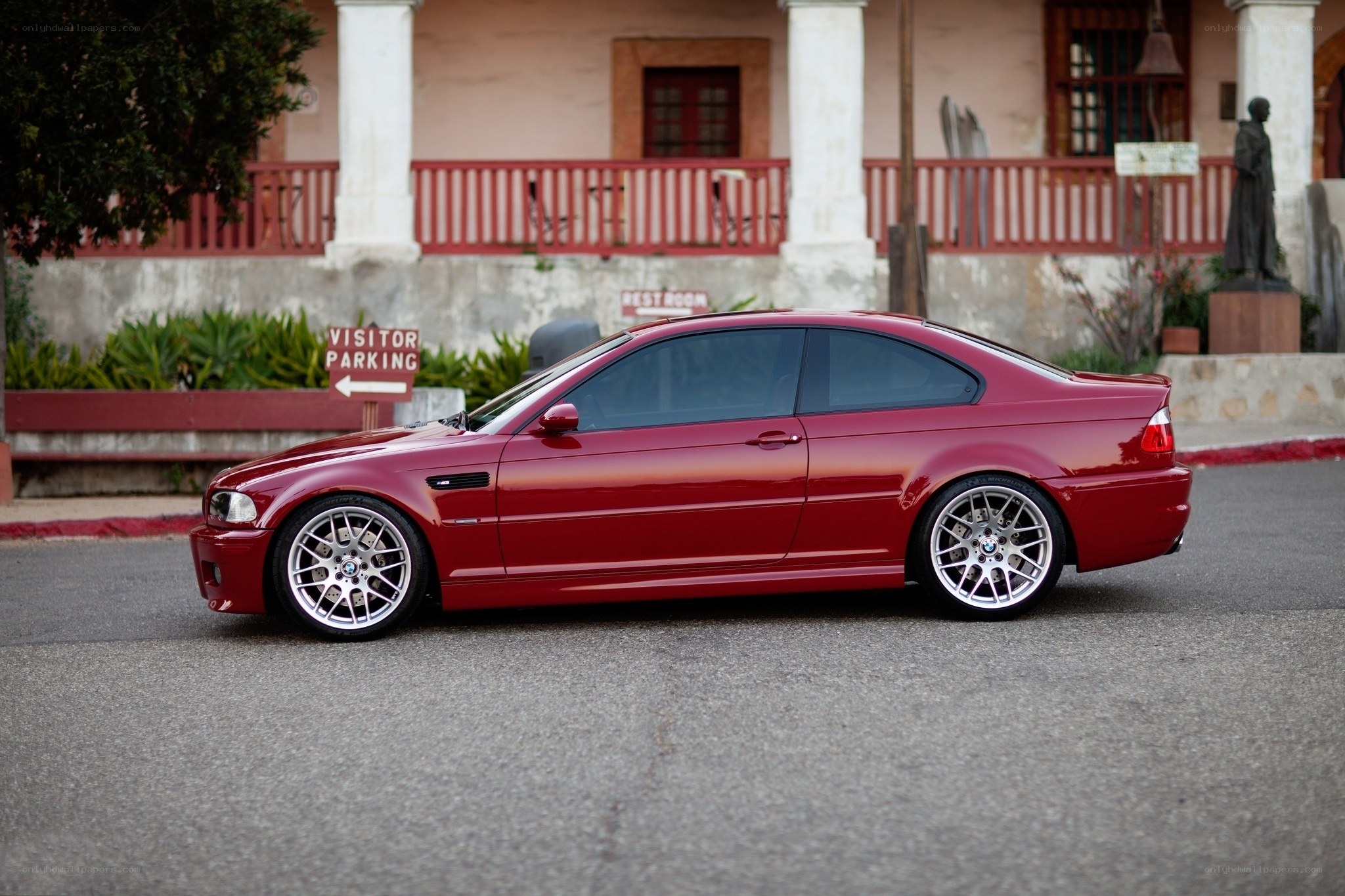 Red BMW M3 parked outside