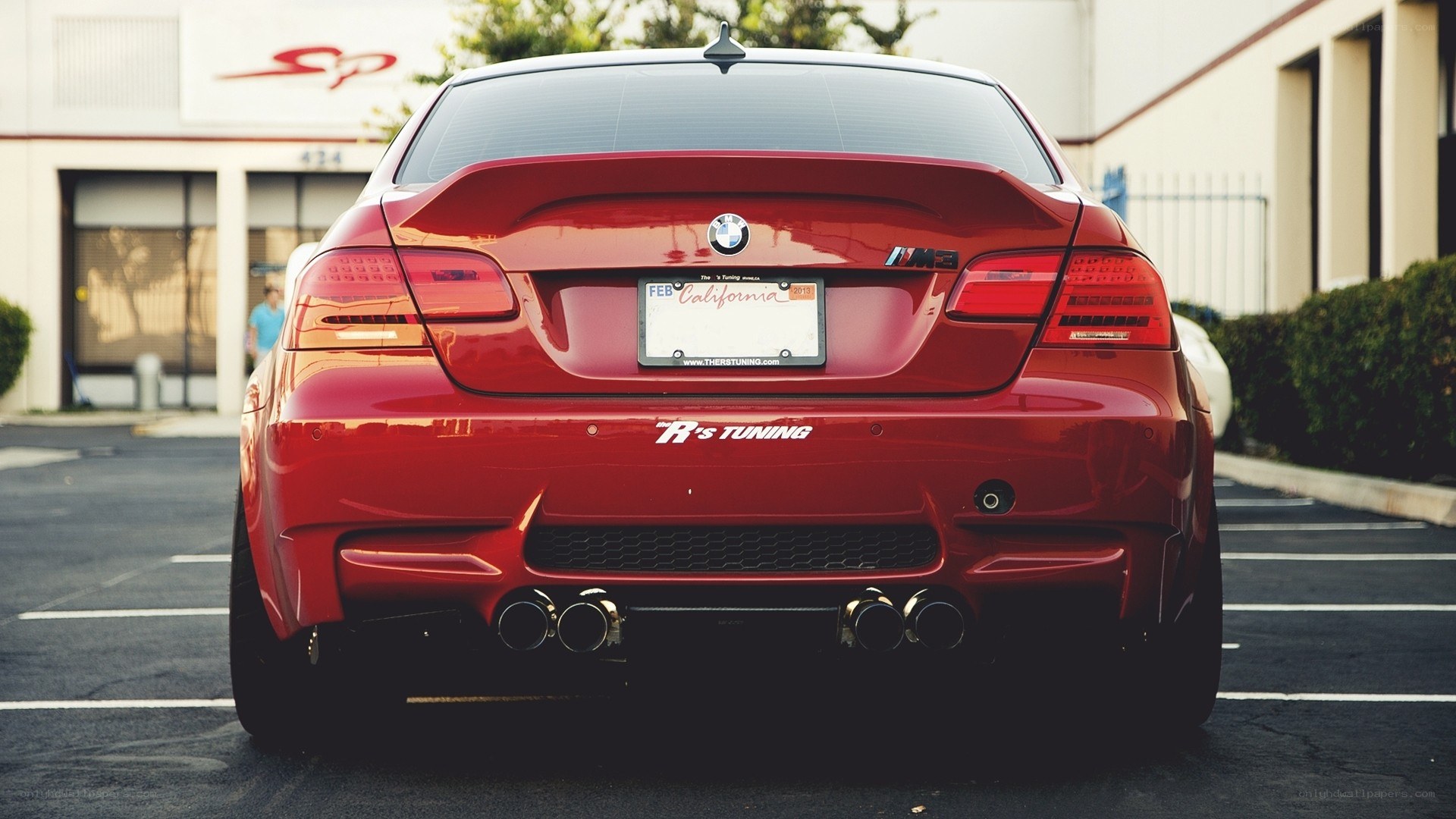 Red BMW M3 rear view