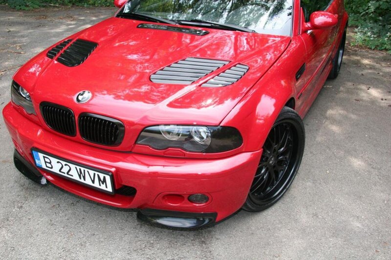 Red BMW M3 with custom hood vents