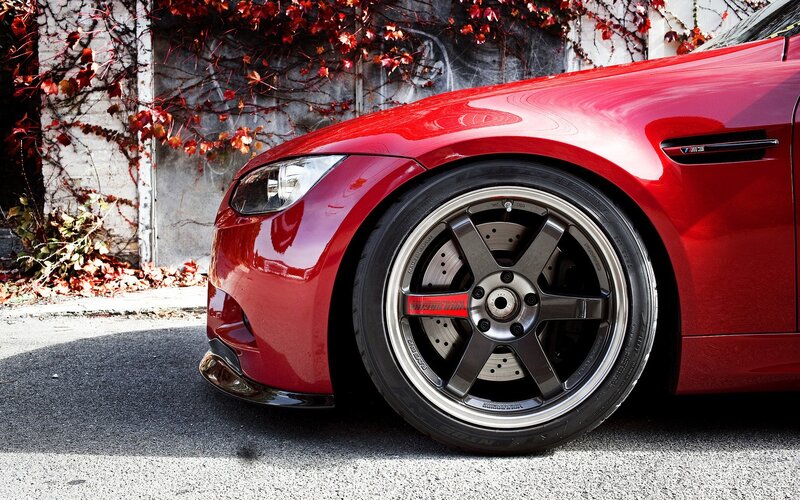 red bmw m3 with custom wheels