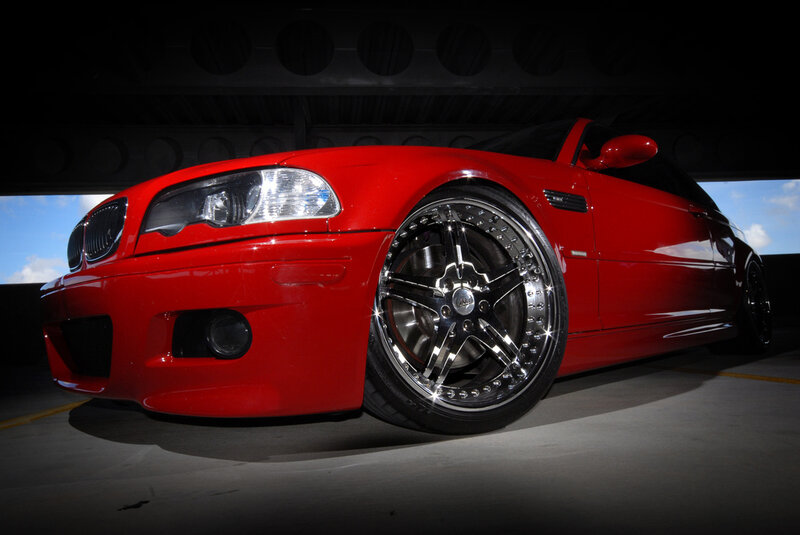 red bmw m3 with custom wheels