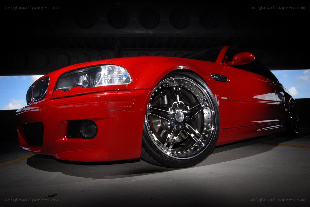 red bmw m3 with custom wheels