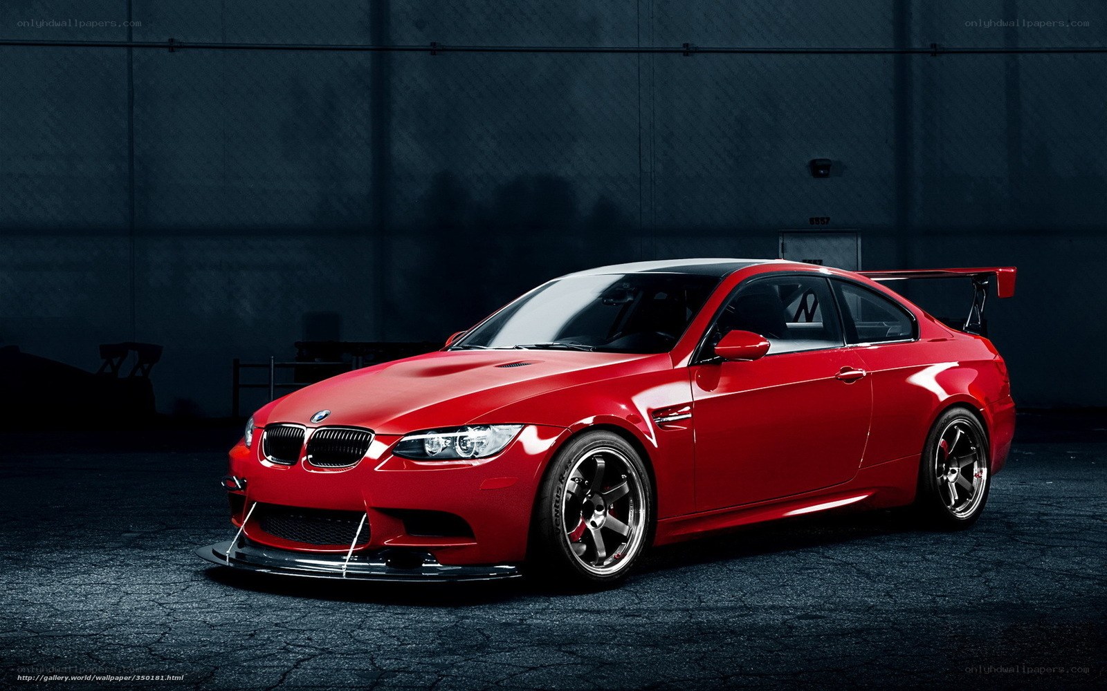Red BMW M3 with rear wing