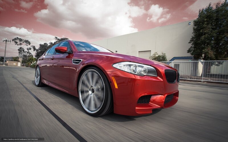 red bmw m5 in motion
