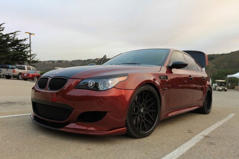 red bmw m5 in parking lot