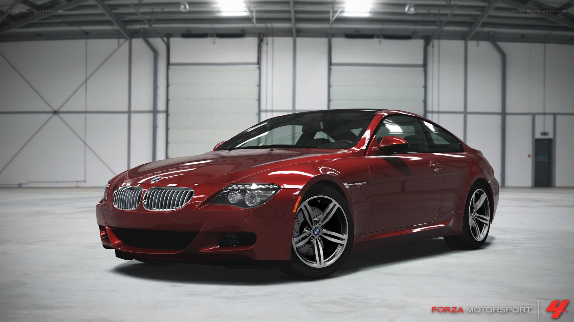 Red BMW M6 in a warehouse