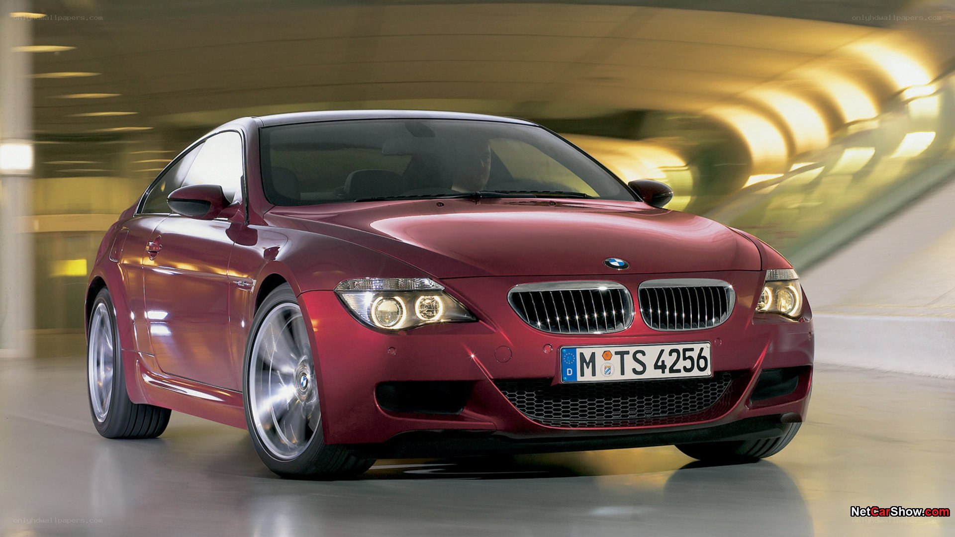 Red BMW M6 in motion