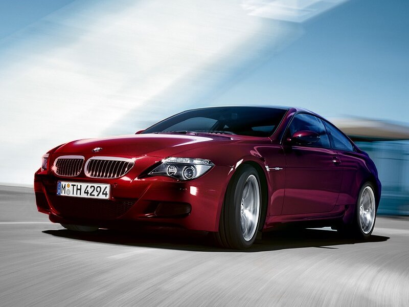 Red BMW M6 in motion