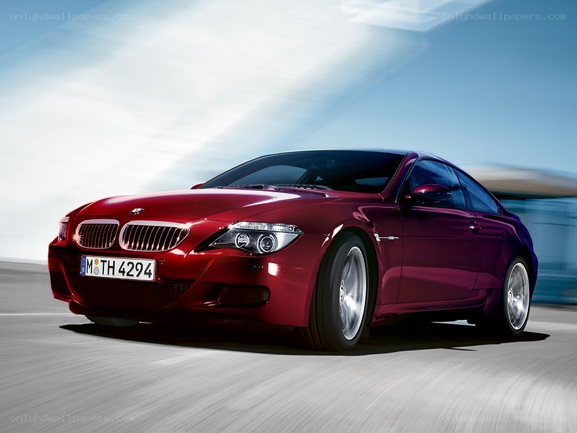 Red BMW M6 in motion