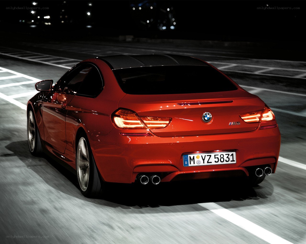 Red BMW M6 in motion