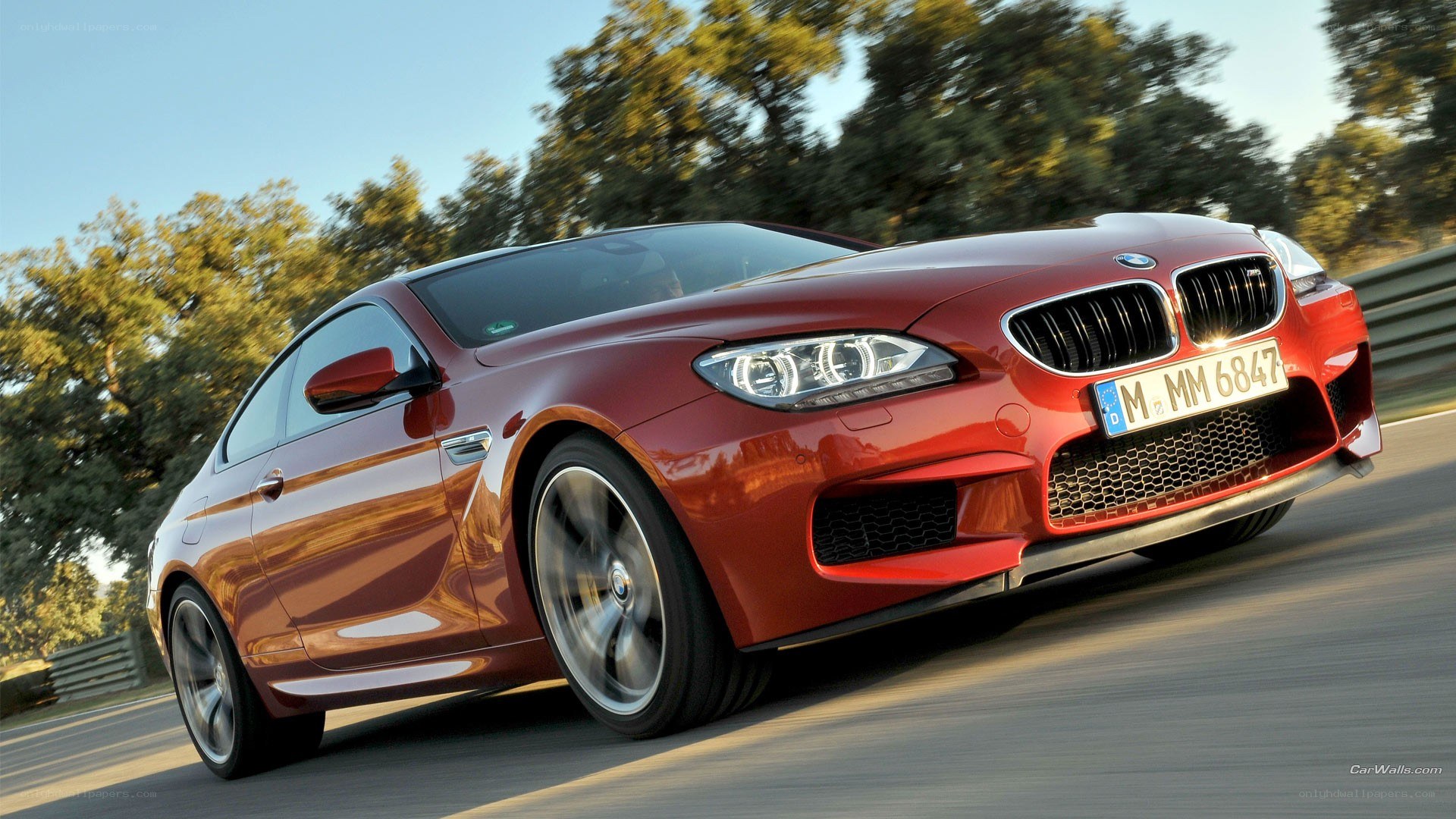 red bmw m6 in motion