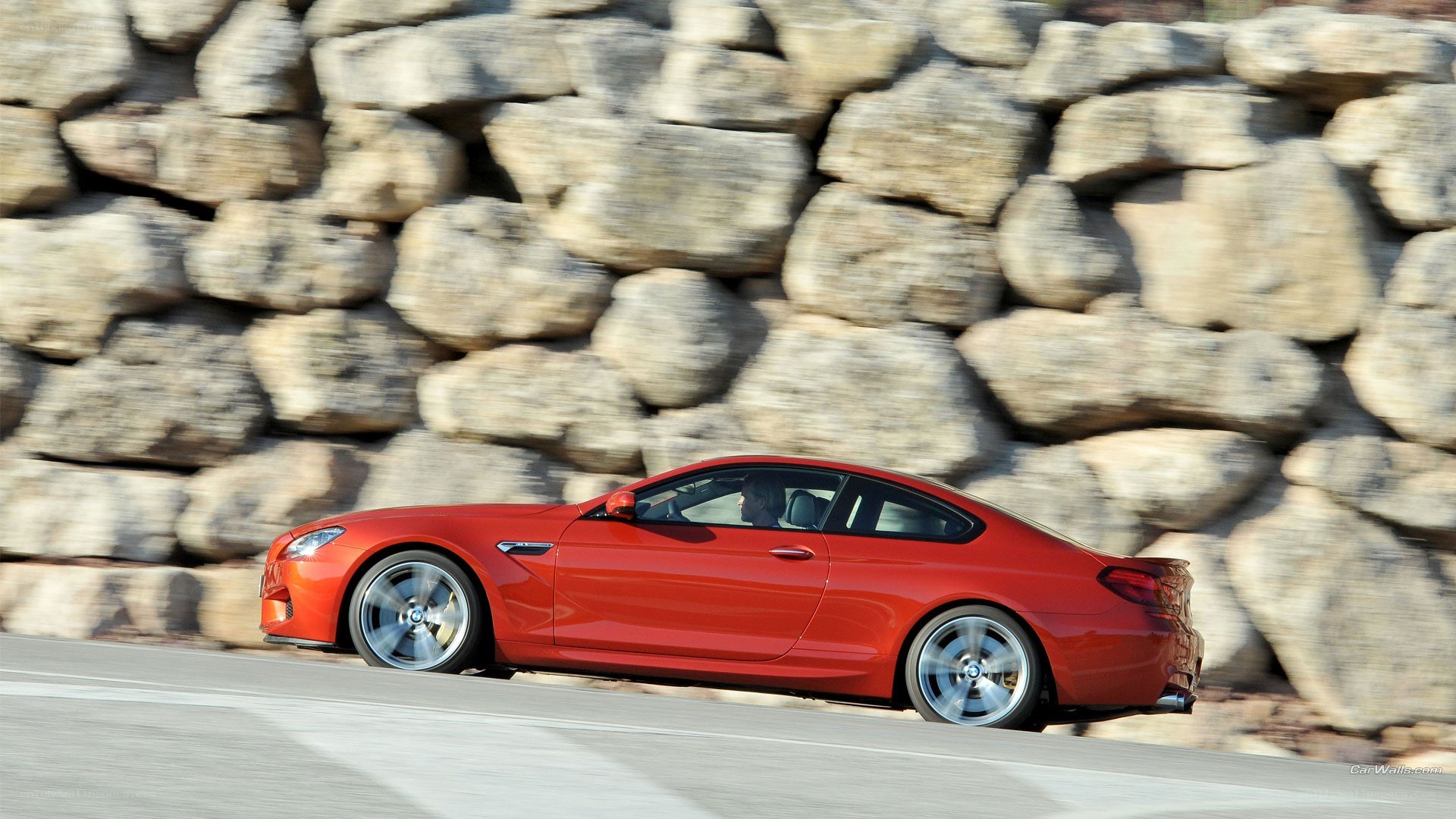 red bmw m6 in motion