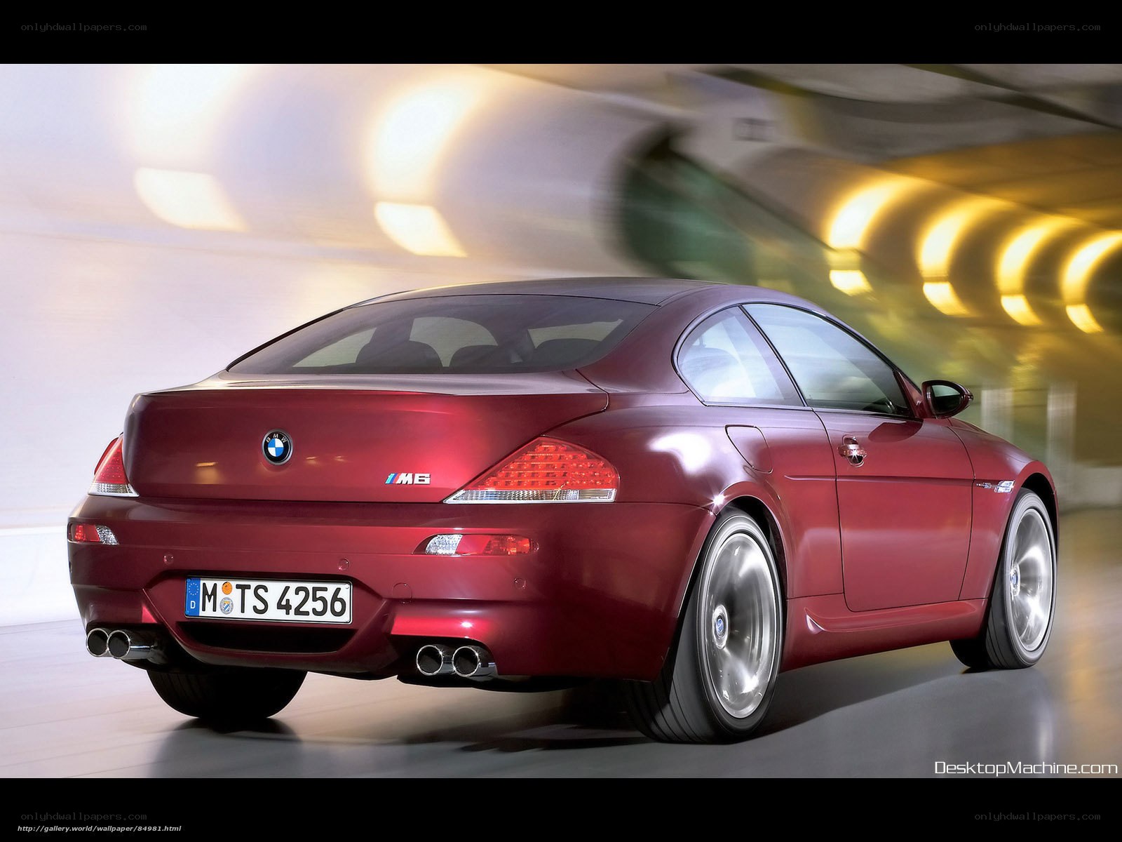 Red BMW M6 in motion