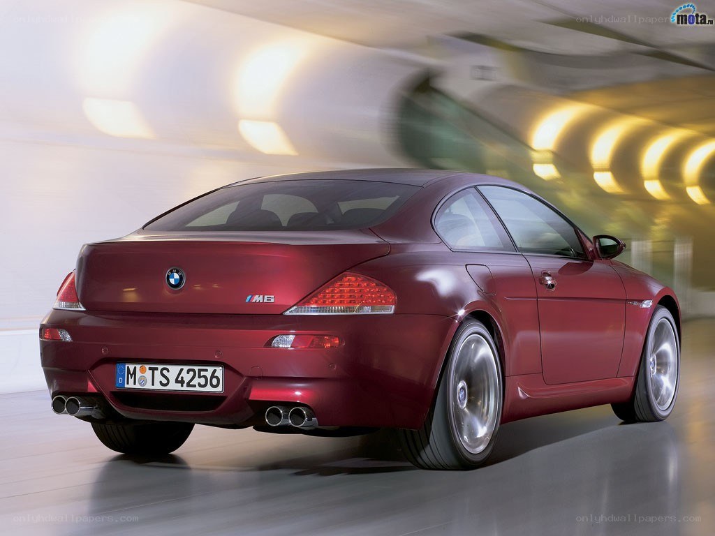 red bmw m6 in motion