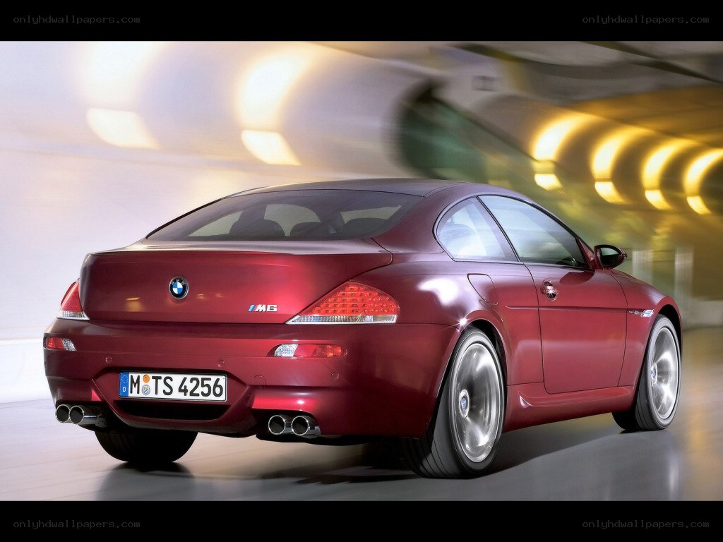 Red BMW M6 in motion