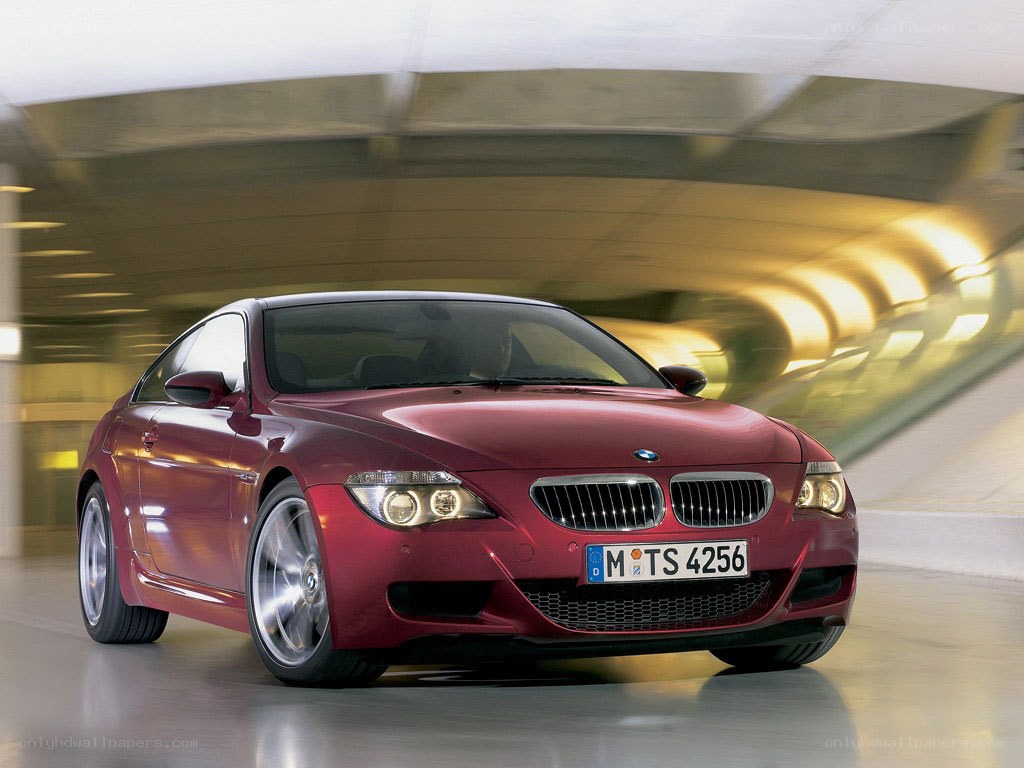 Red BMW M6 in motion