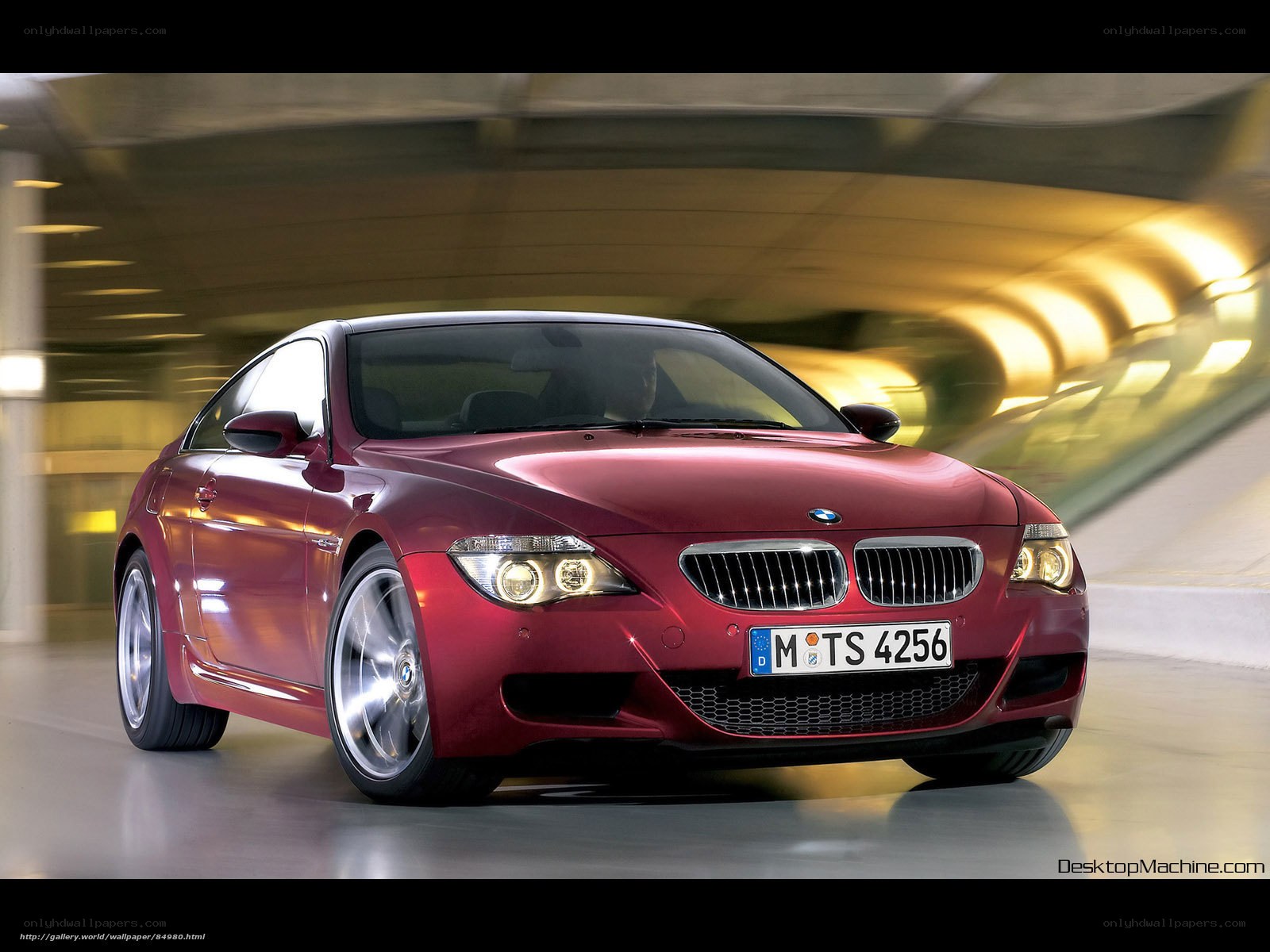 Red BMW M6 in motion