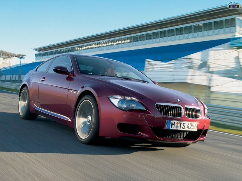 Red BMW M6 on a racetrack