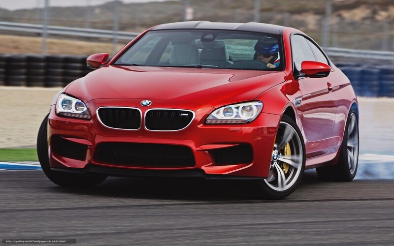 Red BMW M6 on a racetrack
