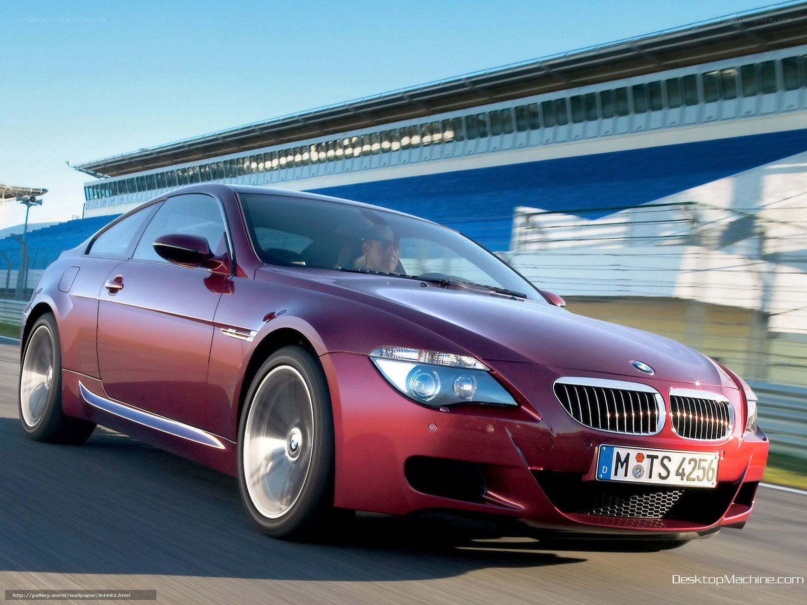 red bmw m6 on a racetrack
