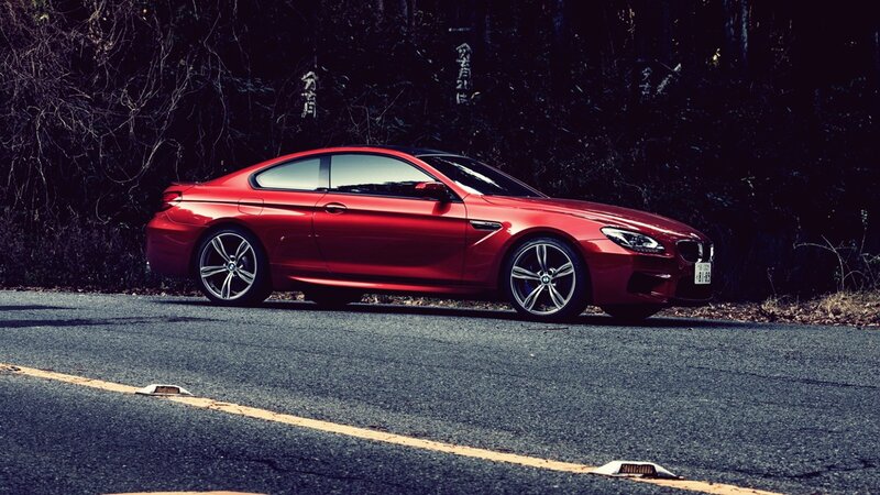 Red BMW M6 on a road
