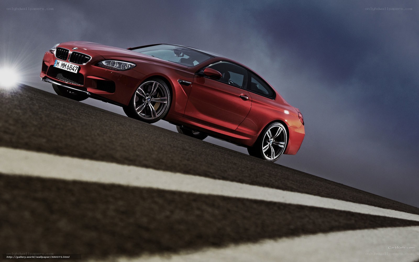red bmw m6 on track
