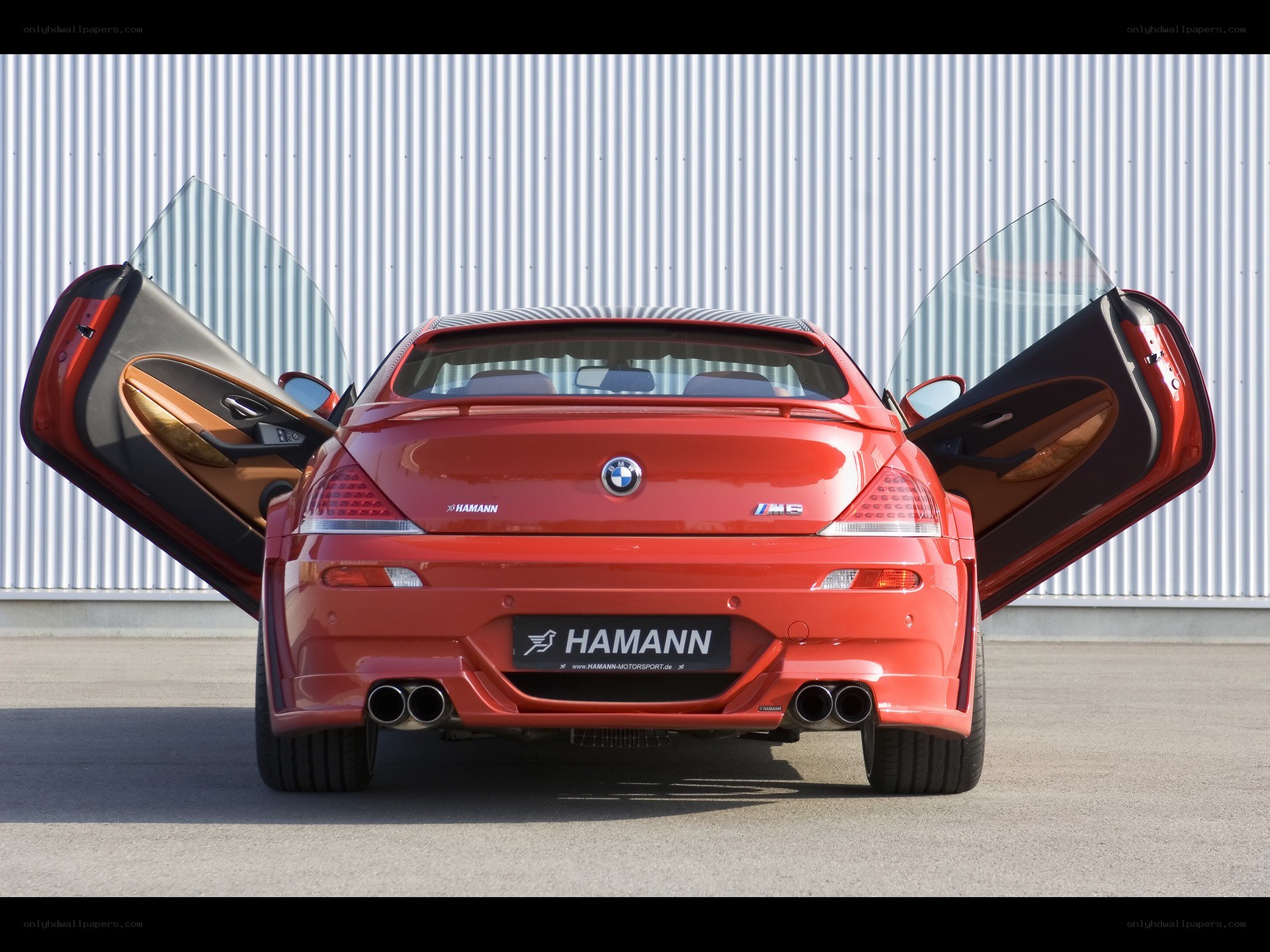 Red BMW M6 with doors open