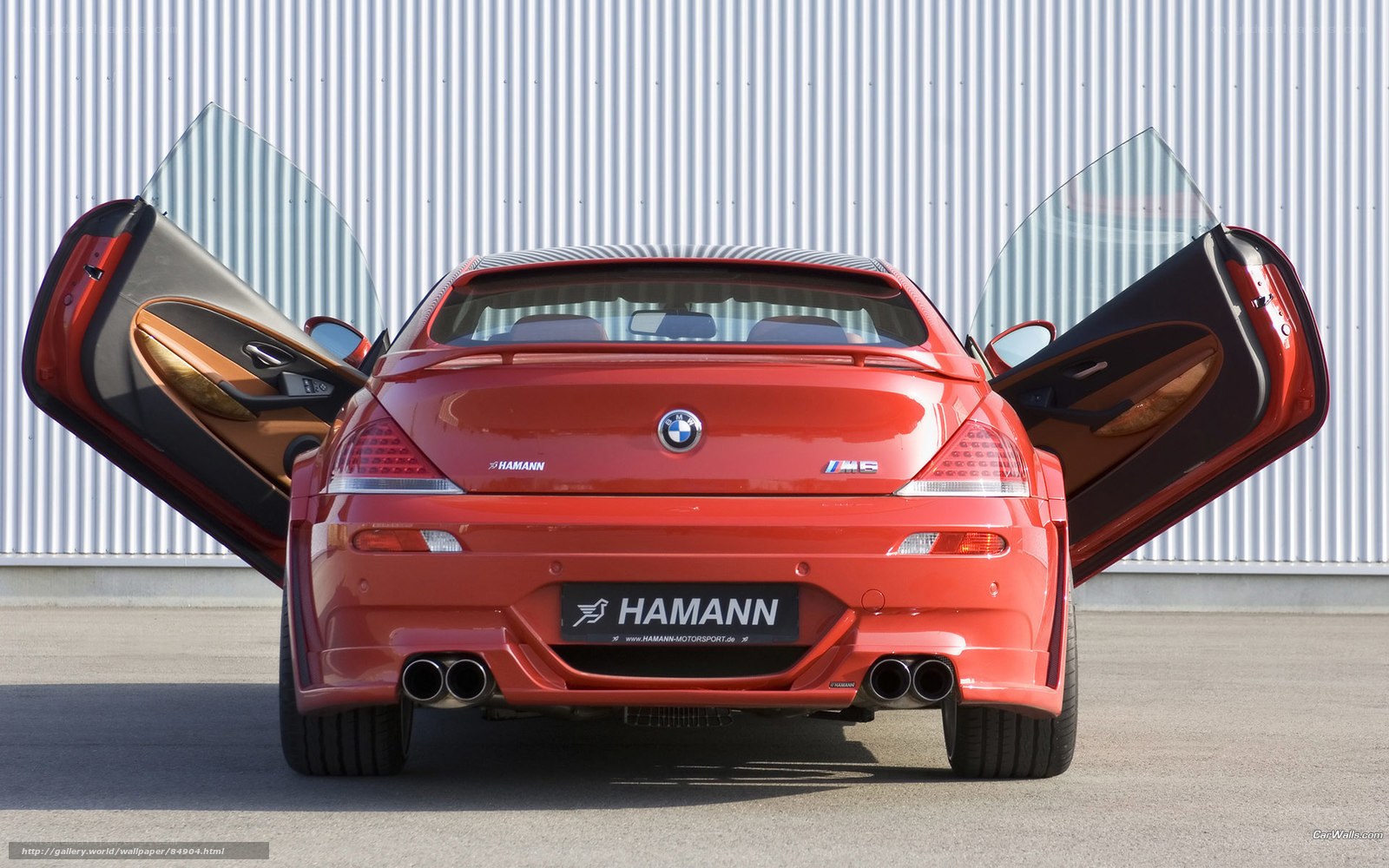 Red BMW M6 with open doors