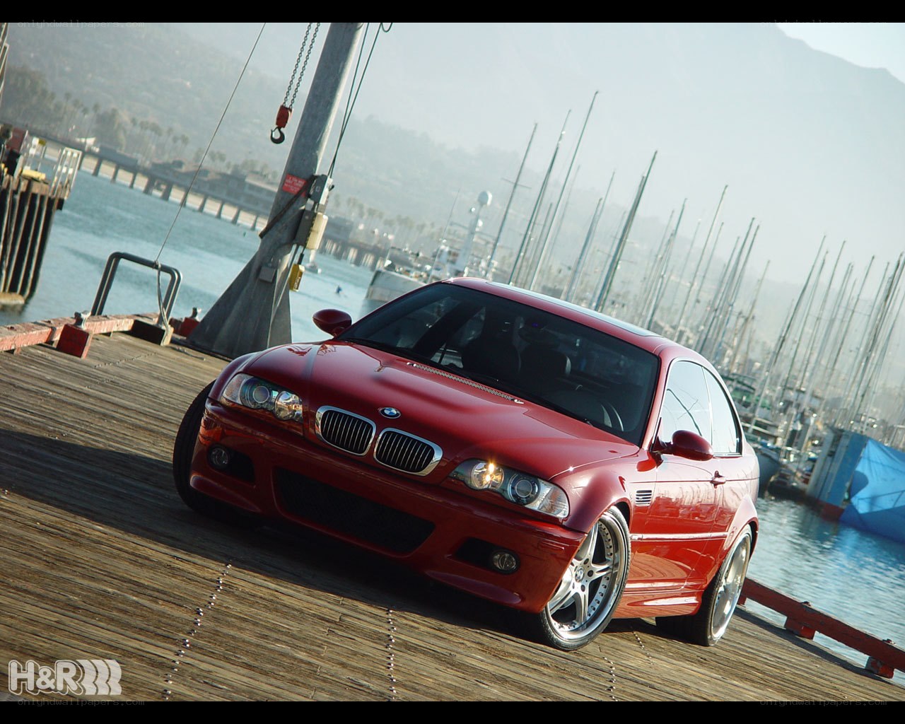 Red BMW on a dock