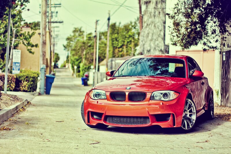 Red BMW on a quiet street