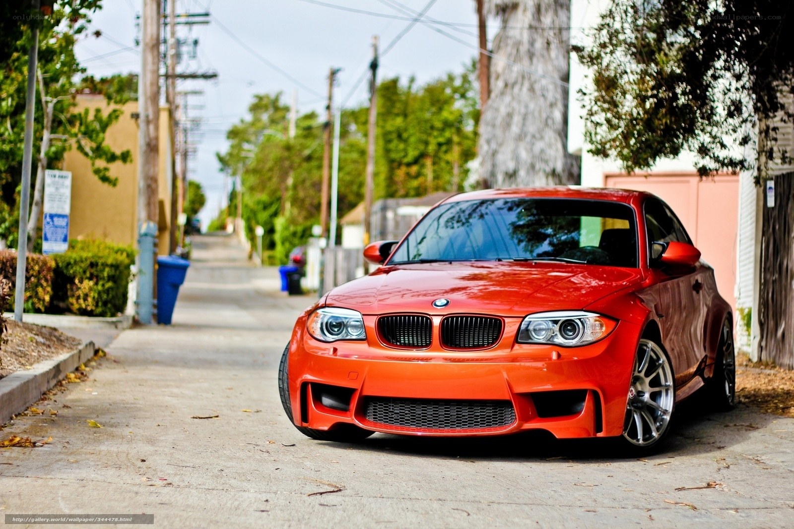 Red BMW on a quiet street
