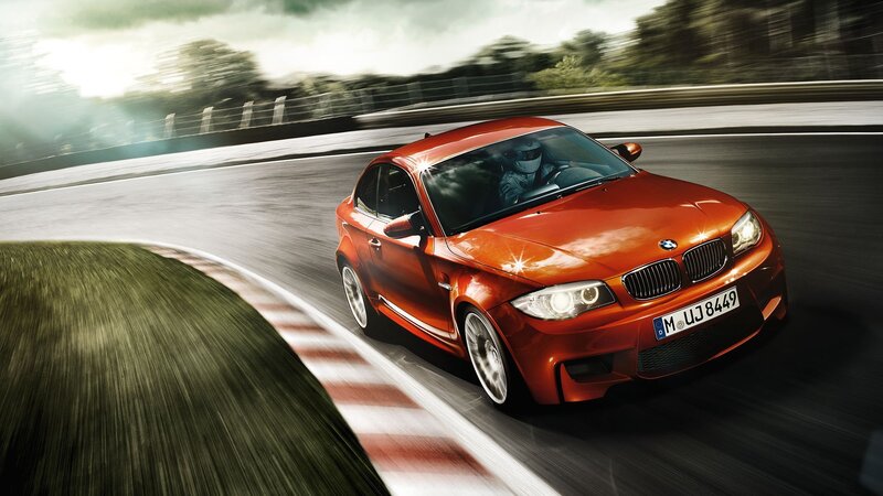Red BMW on a racetrack