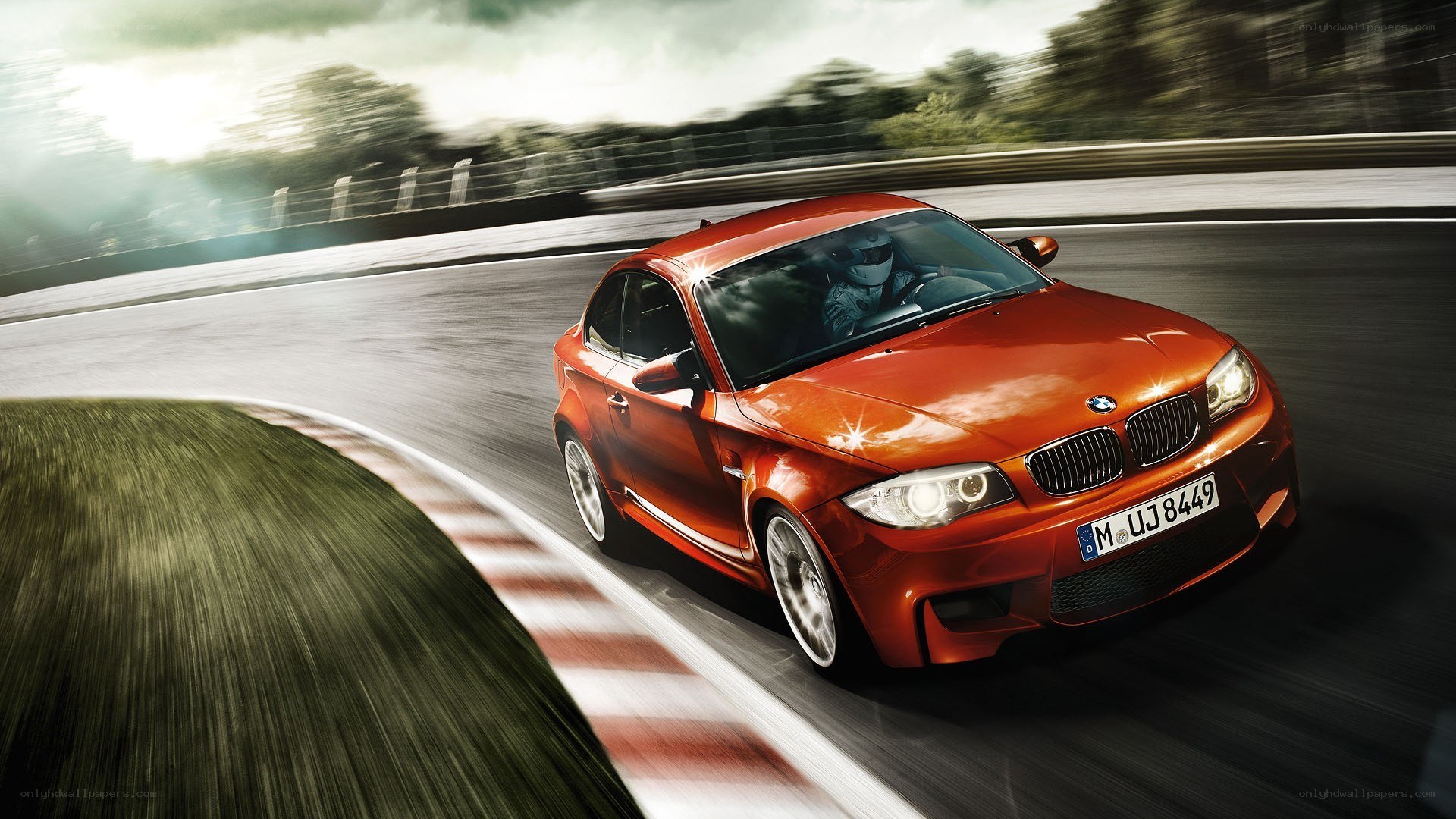 Red BMW on a racetrack