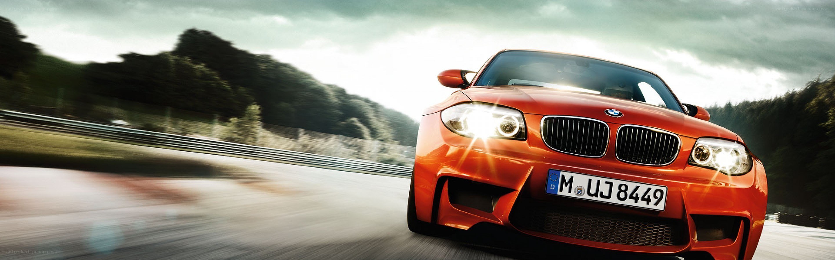 red bmw on a racetrack