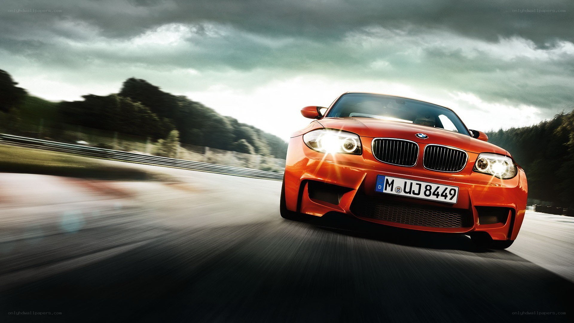 Red BMW on a racetrack