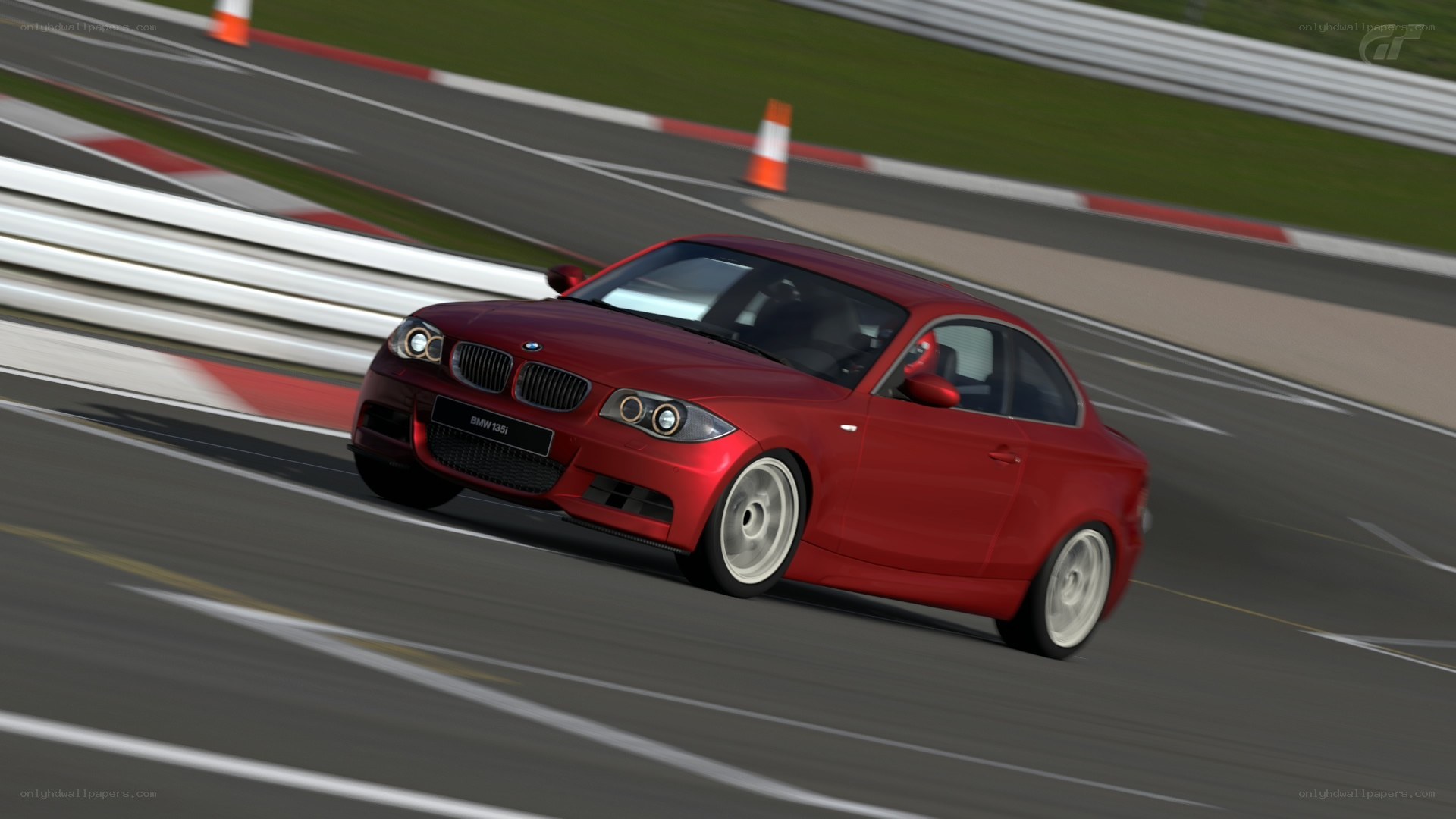 Red BMW on a racetrack
