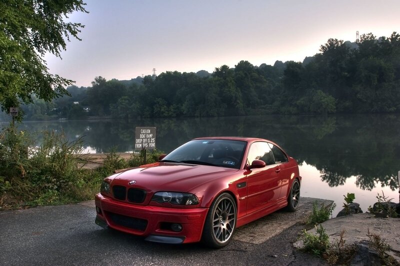 Red BMW on lakeside