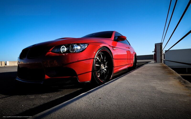 Red BMW on rooftop