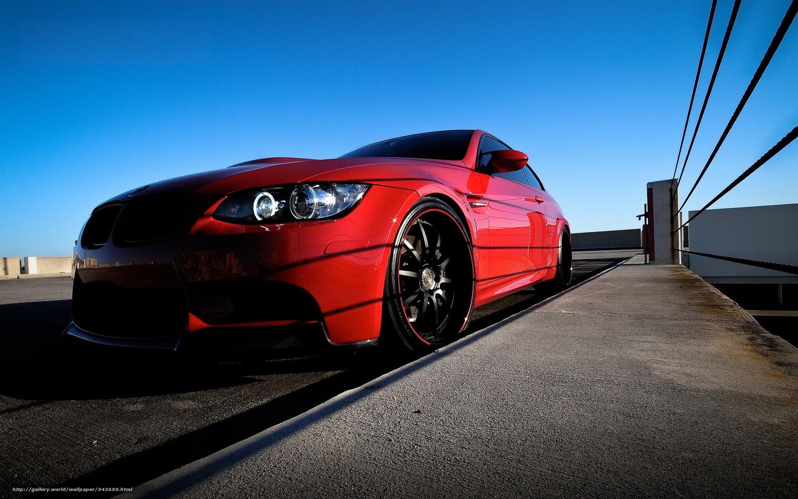 Red BMW on rooftop
