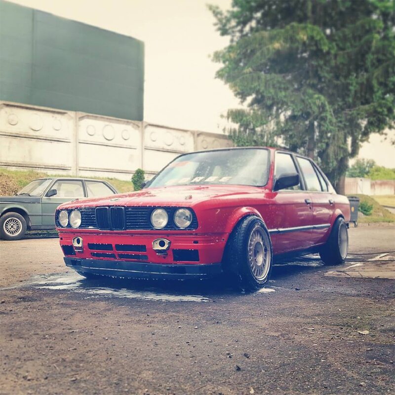 Red Bmw Sedan — Overcast