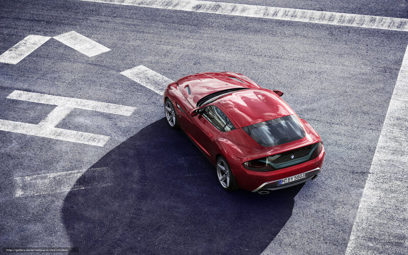 Red BMW sports car on track