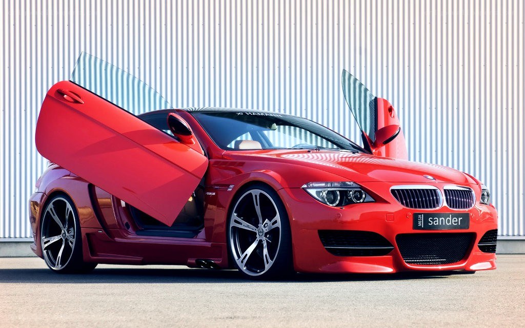 Red BMW with gullwing doors