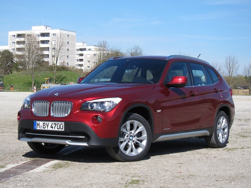 Red BMW X1 parked outdoors