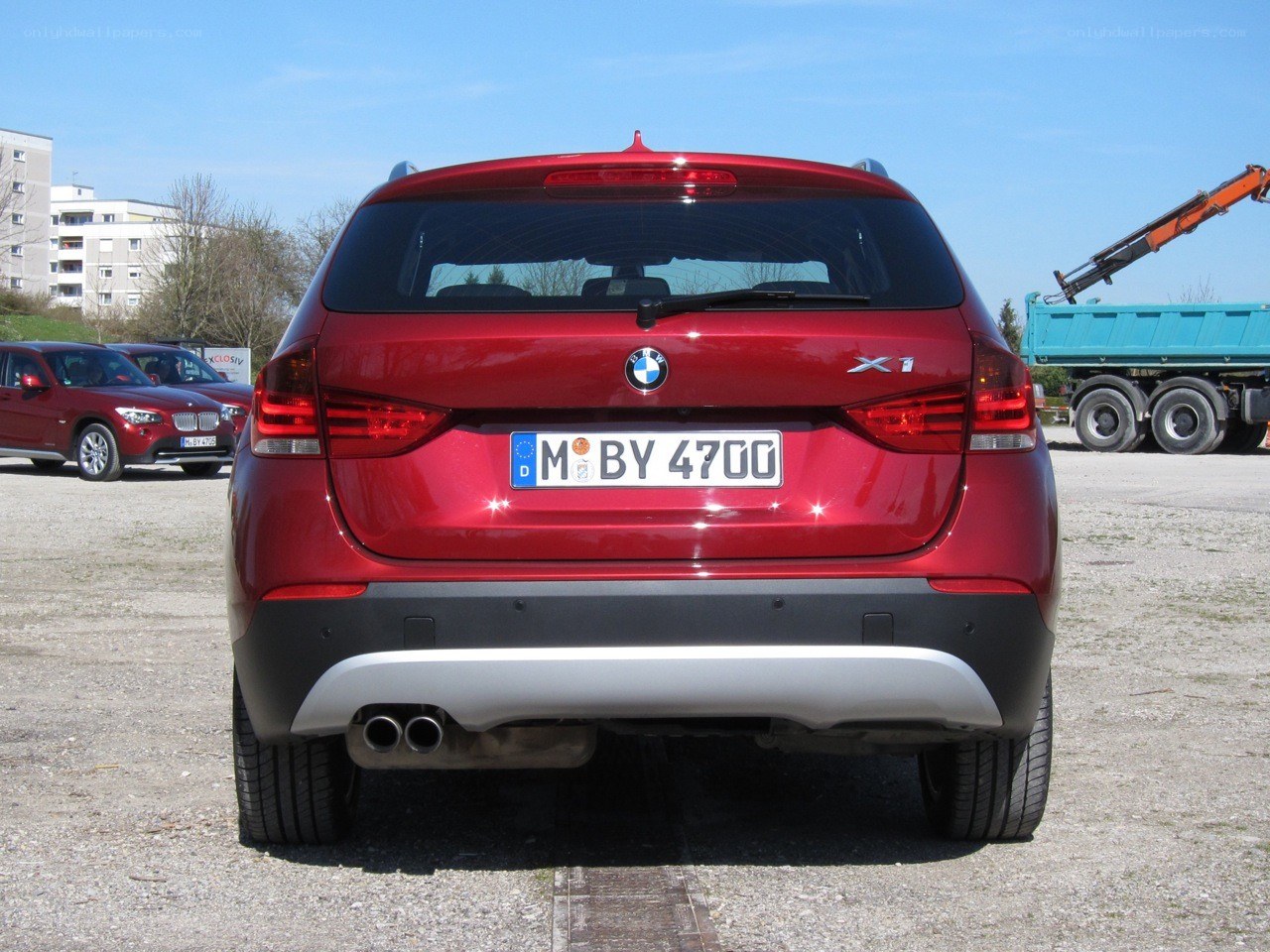 Red BMW X1 rear view
