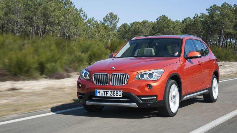 Red BMW X1 SUV — Dynamic, Afternoon, Photograph, Driver