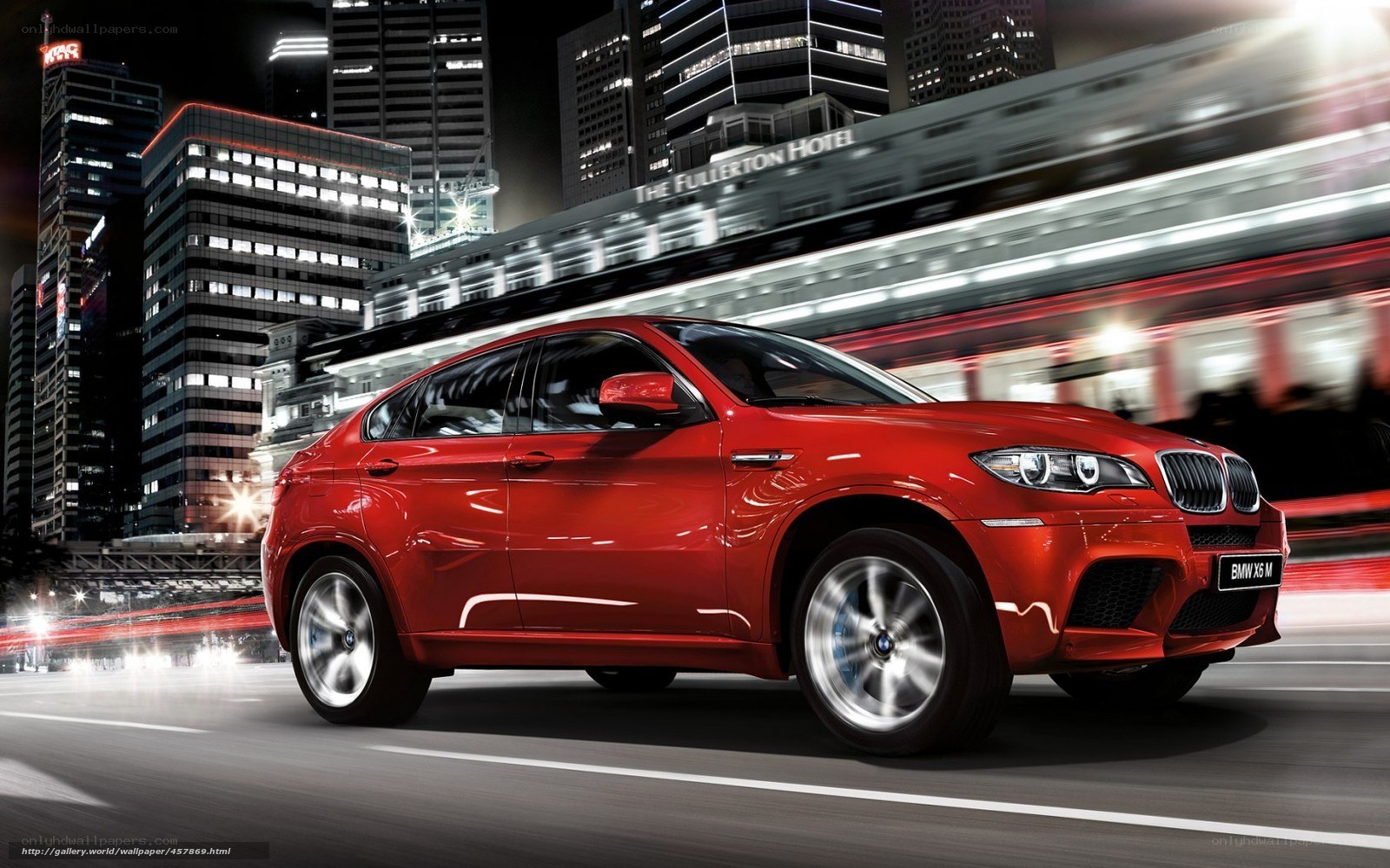 Red BMW X6 M in city