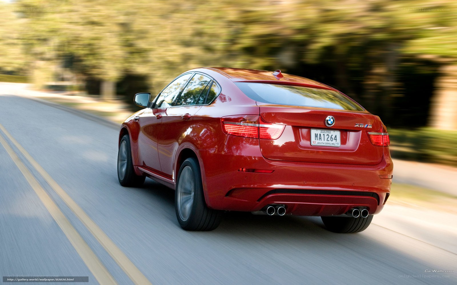 Red BMW X6 M in motion