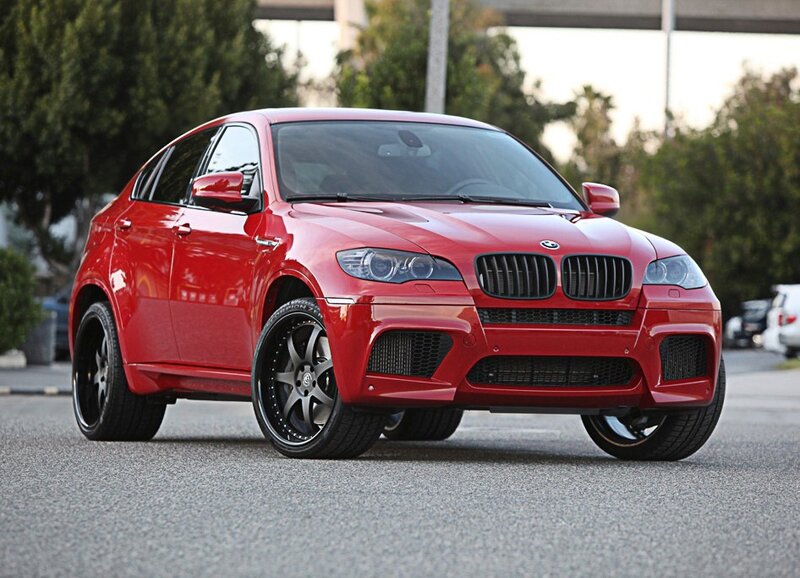 Red BMW X6 M parked