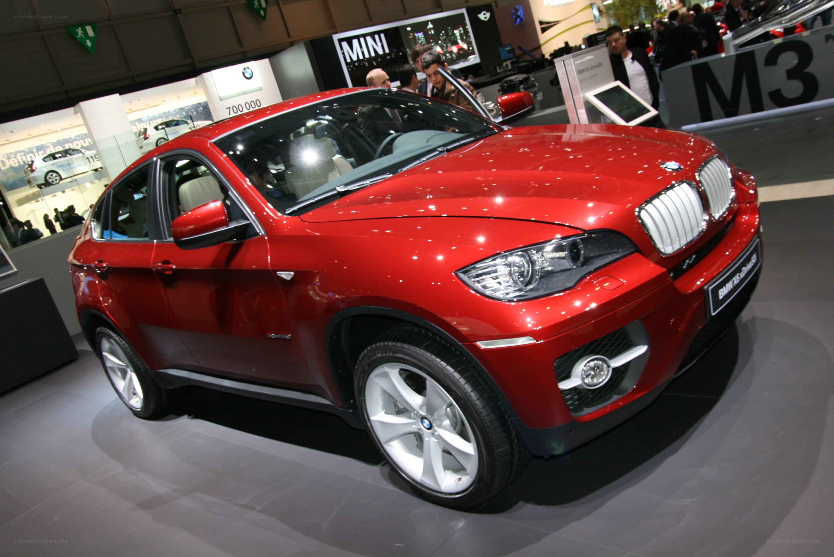 Red BMW X6 on display